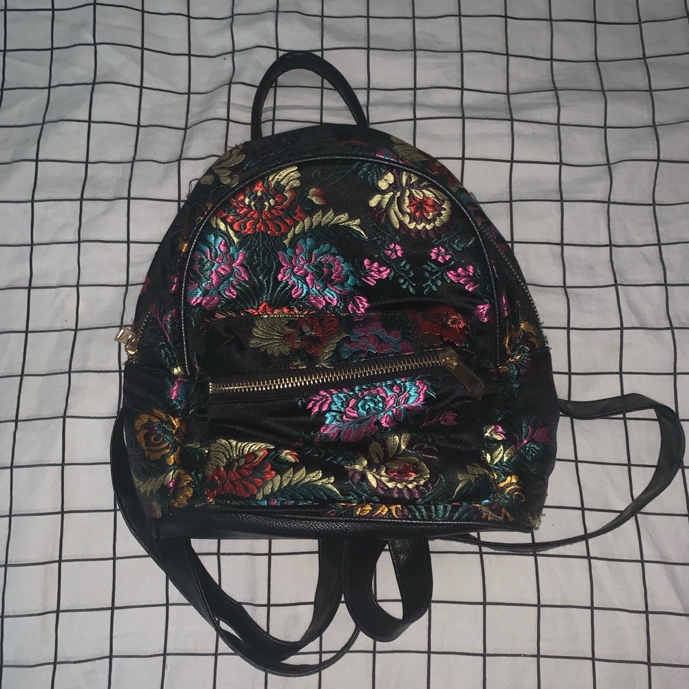floral and faux leather book bag